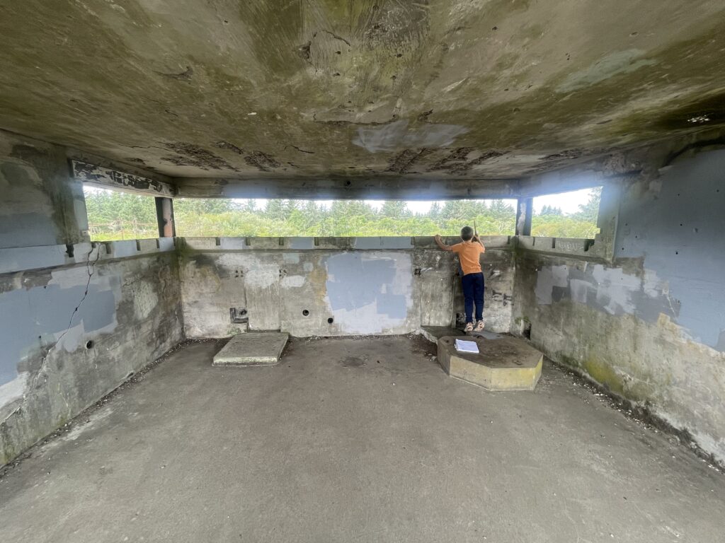 Looking out of a bunker at Battery Russell at Fort Stevens State Park