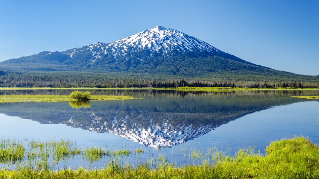 Mount Bachelor being reflected in Sparks Lake near Bend, Oregon