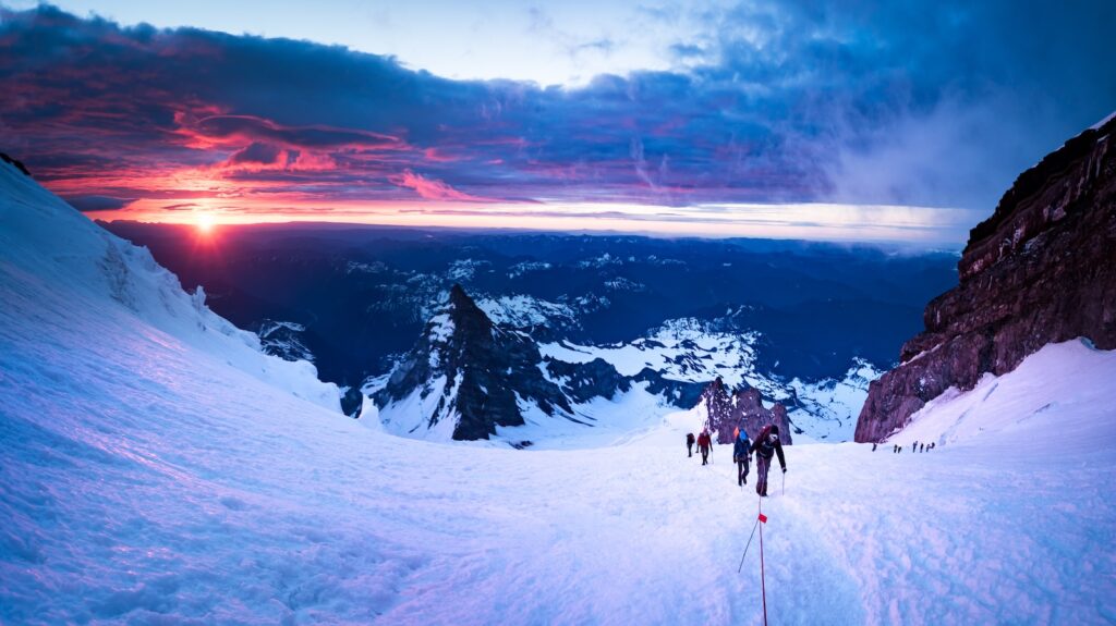 Early morning sunrise as climbers attempt to summit Mt Rainier in Washington