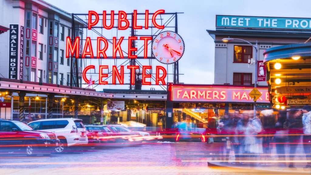 beautiful Pike place market with reflection on the ground  at night.