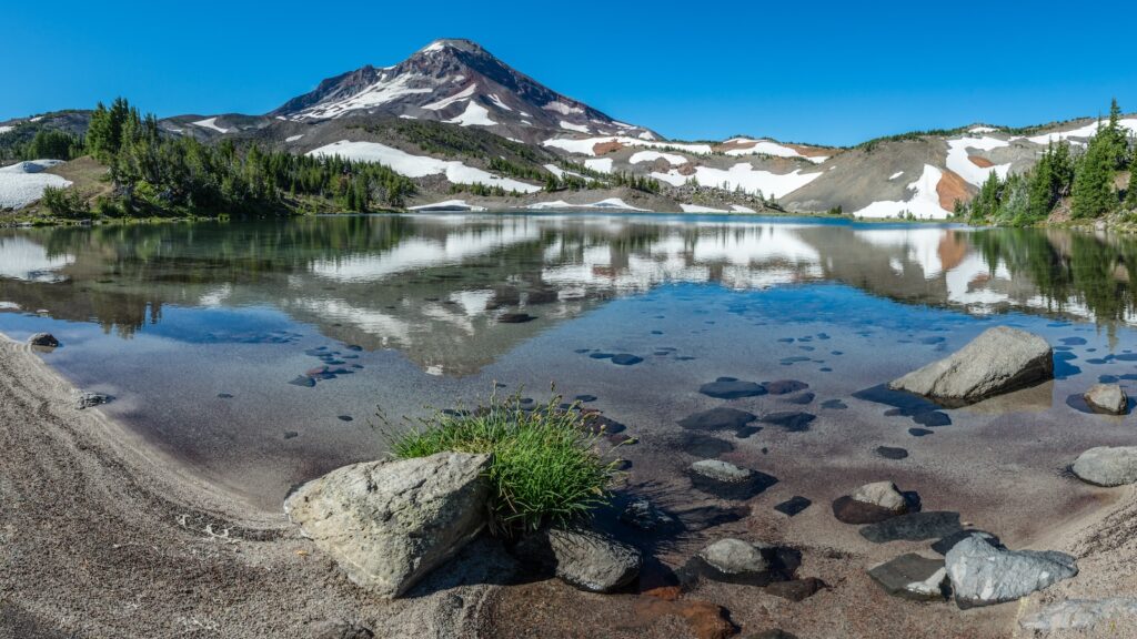 Camp Lake in the Three Sisters Wilderness in Oregon sits at nearly 7000 foot elevation. South Sister is in the background