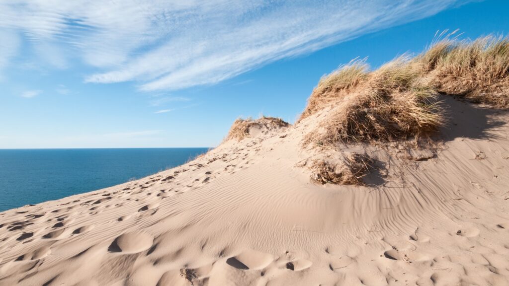 sand dunes on the shore of lake michigan